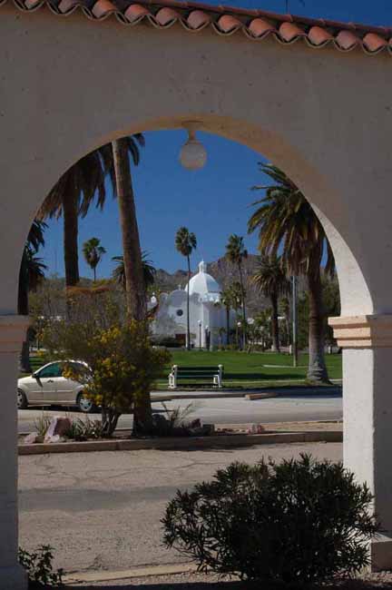 an Ajo church framed by the plaza's Moorish architecture